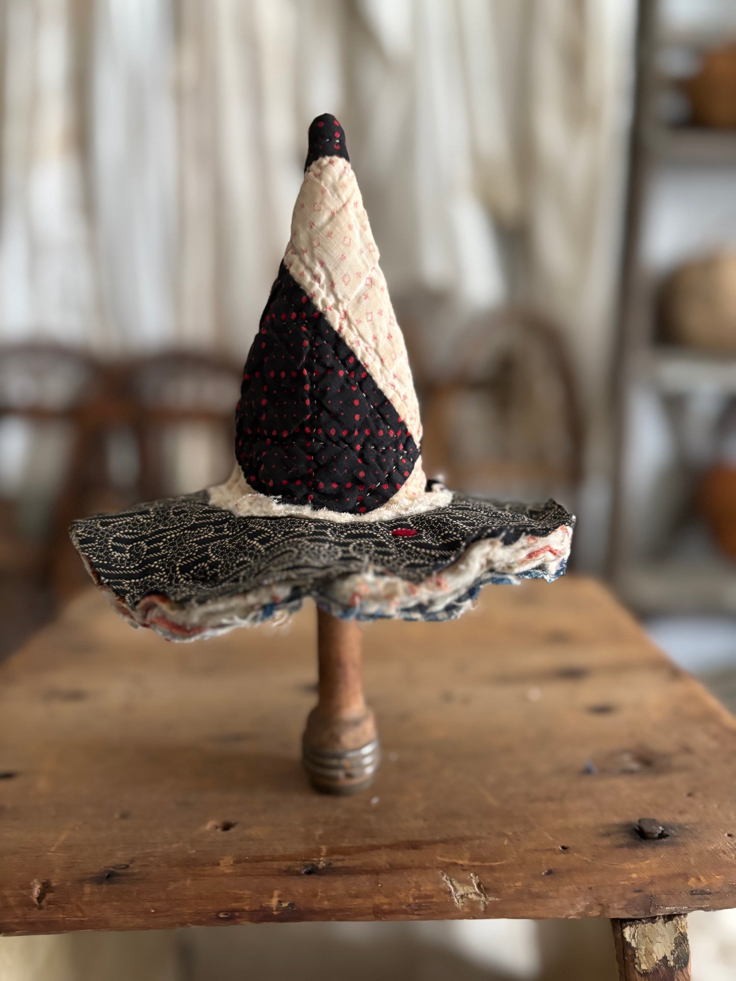 Mini witch hat on spool