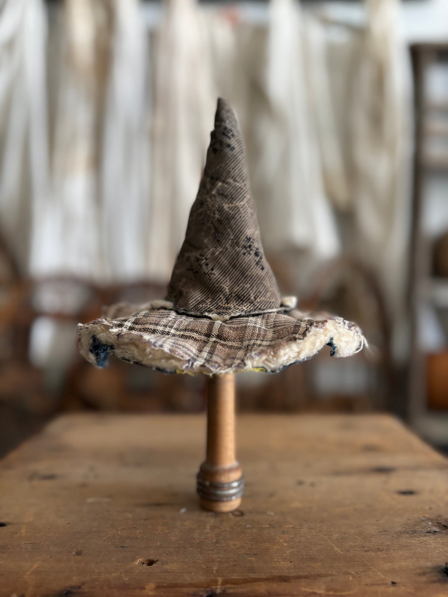 Mini witch hat on spool