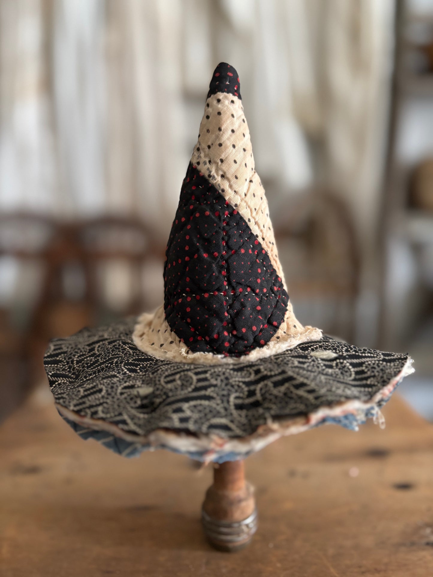 Mini witch hat on spool