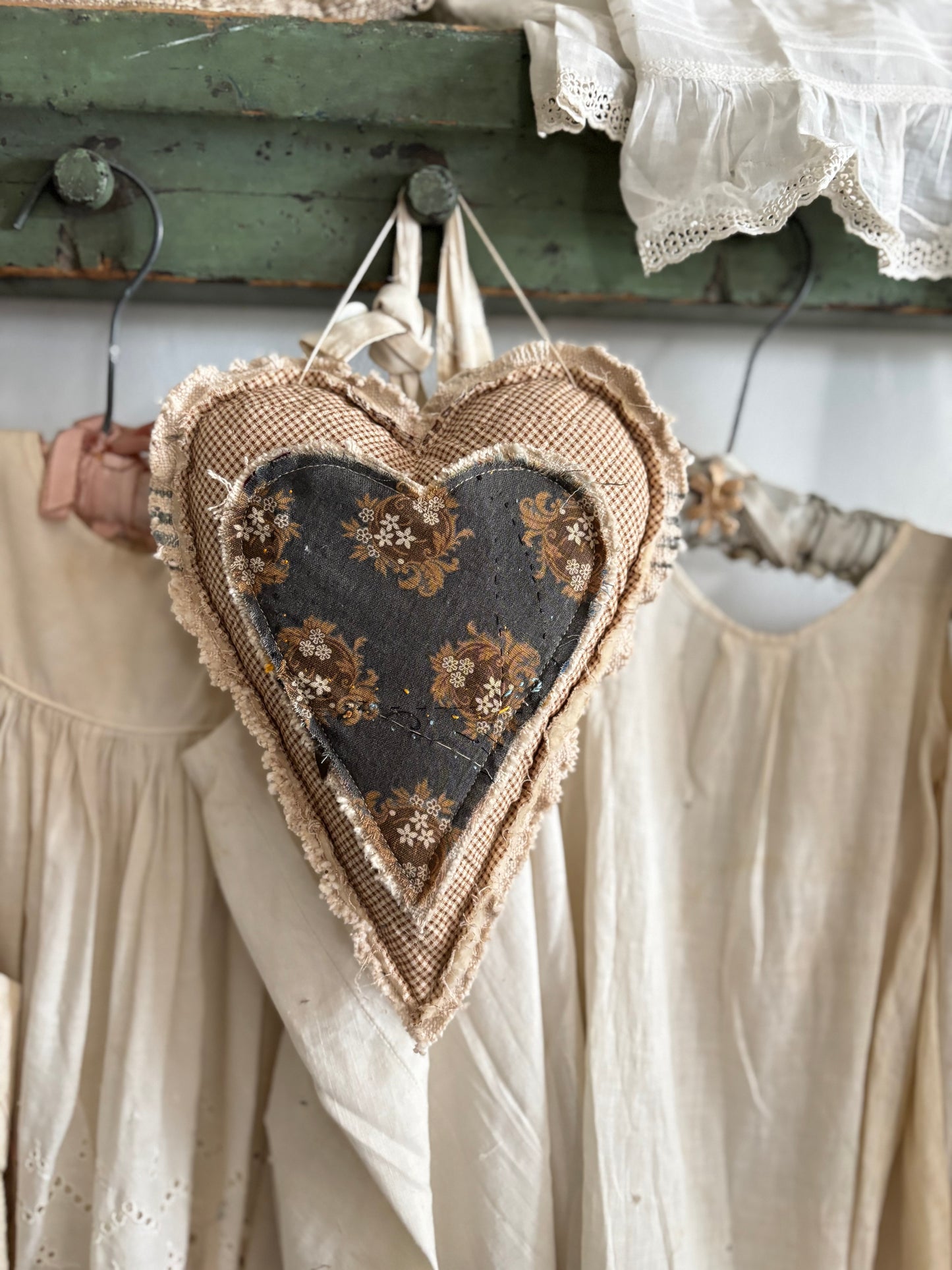 Antique quilt hanging heart