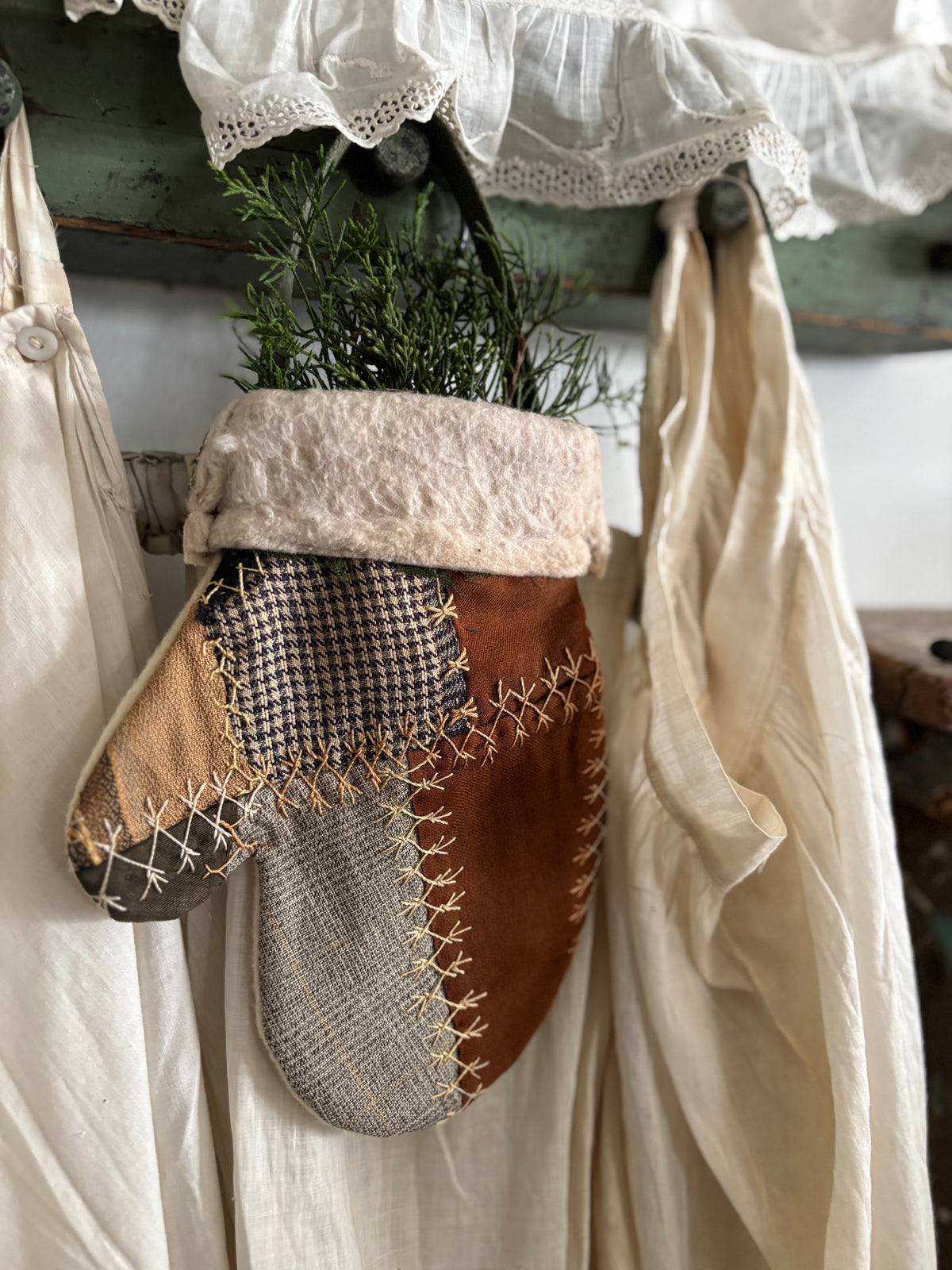 Antique quilt hanging mitten