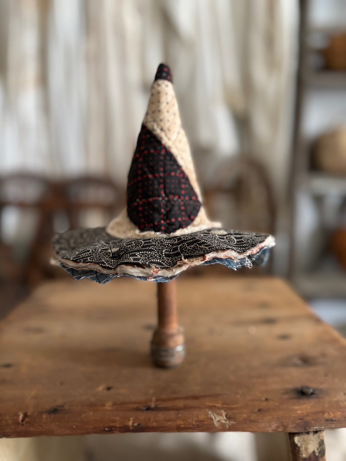 Mini witch hat on spool