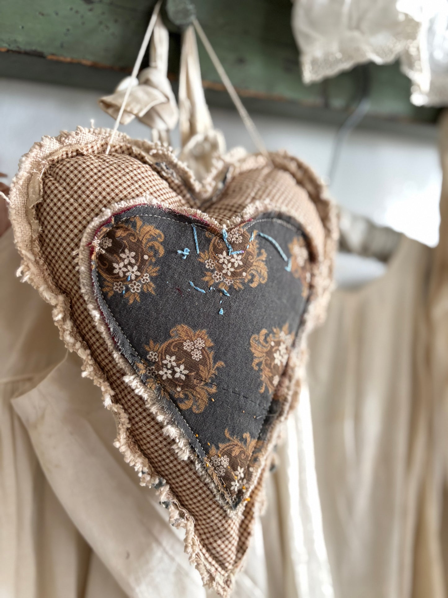 Antique quilt hanging heart