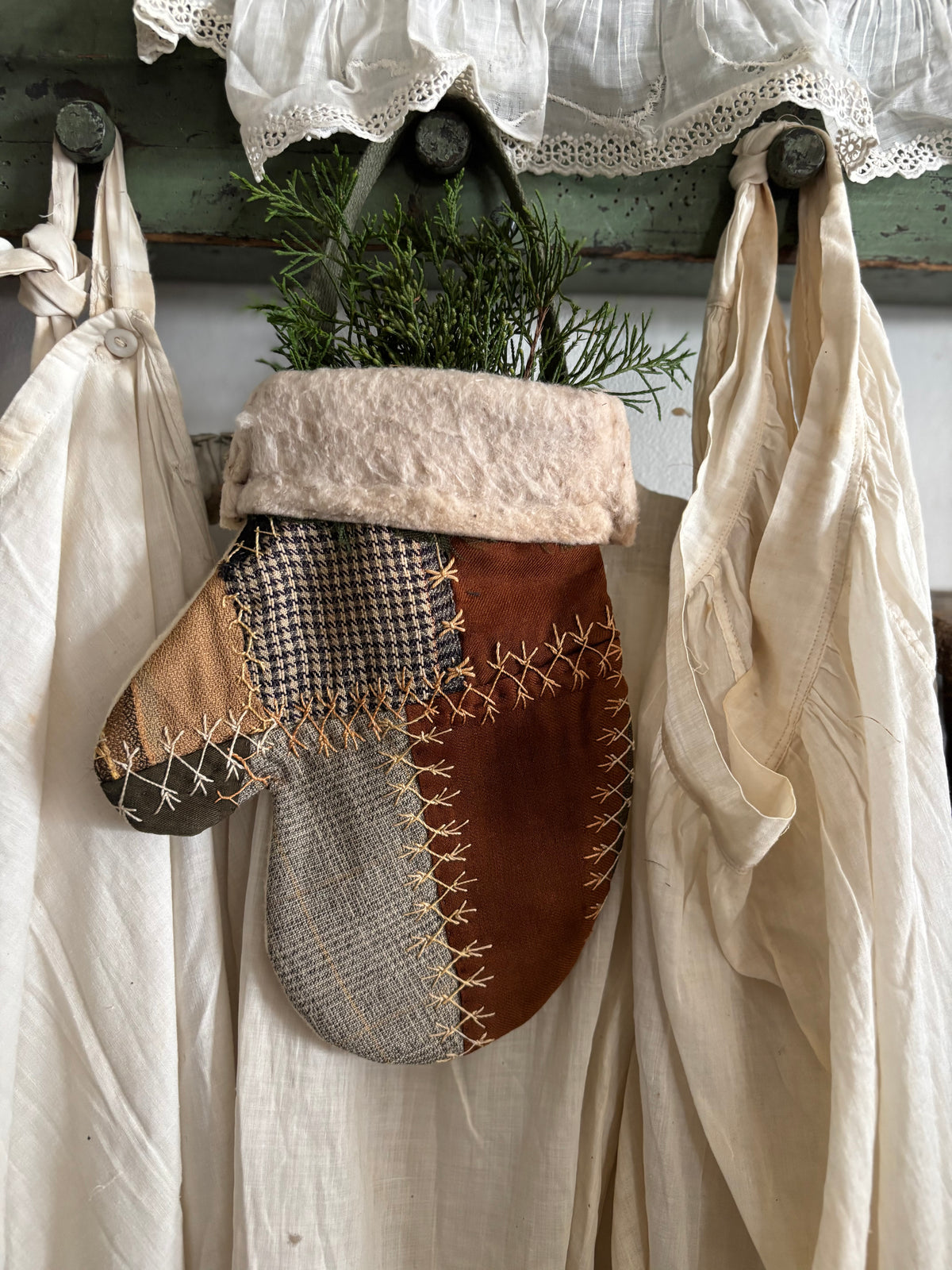 Antique quilt hanging mitten