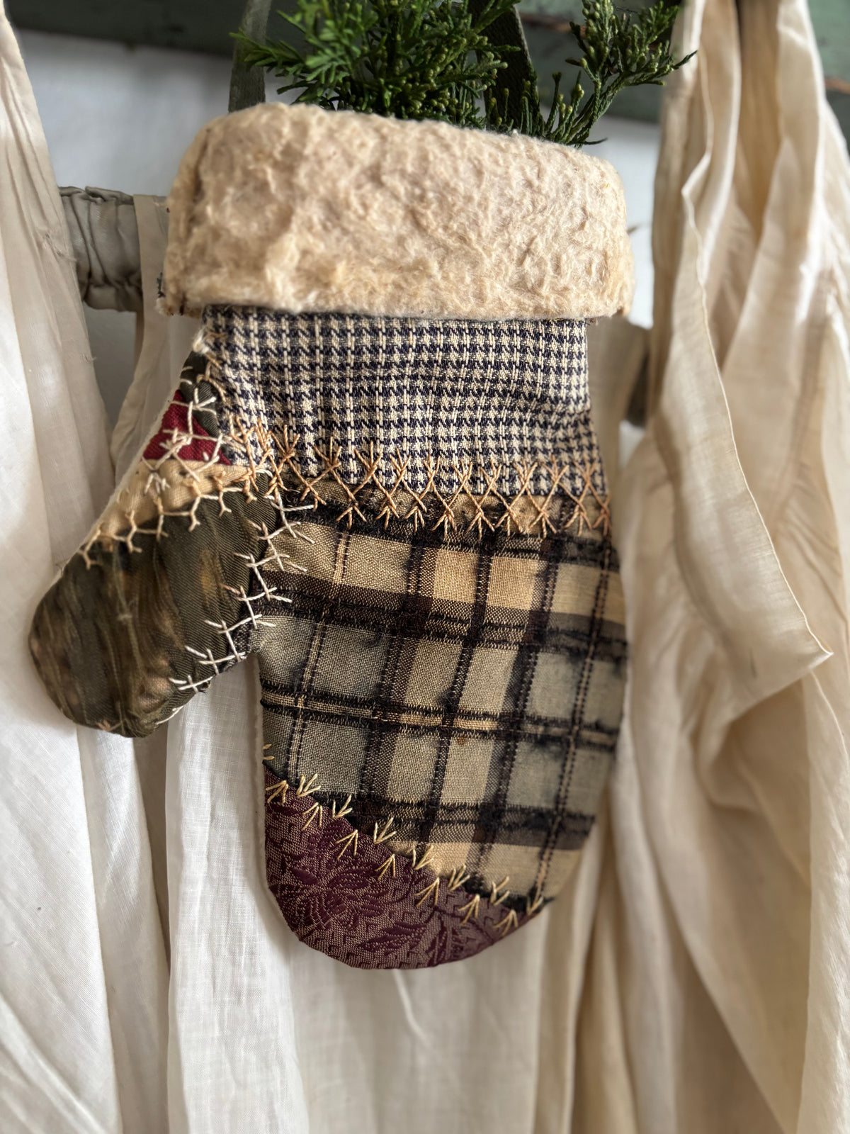 Antique quilt hanging mitten