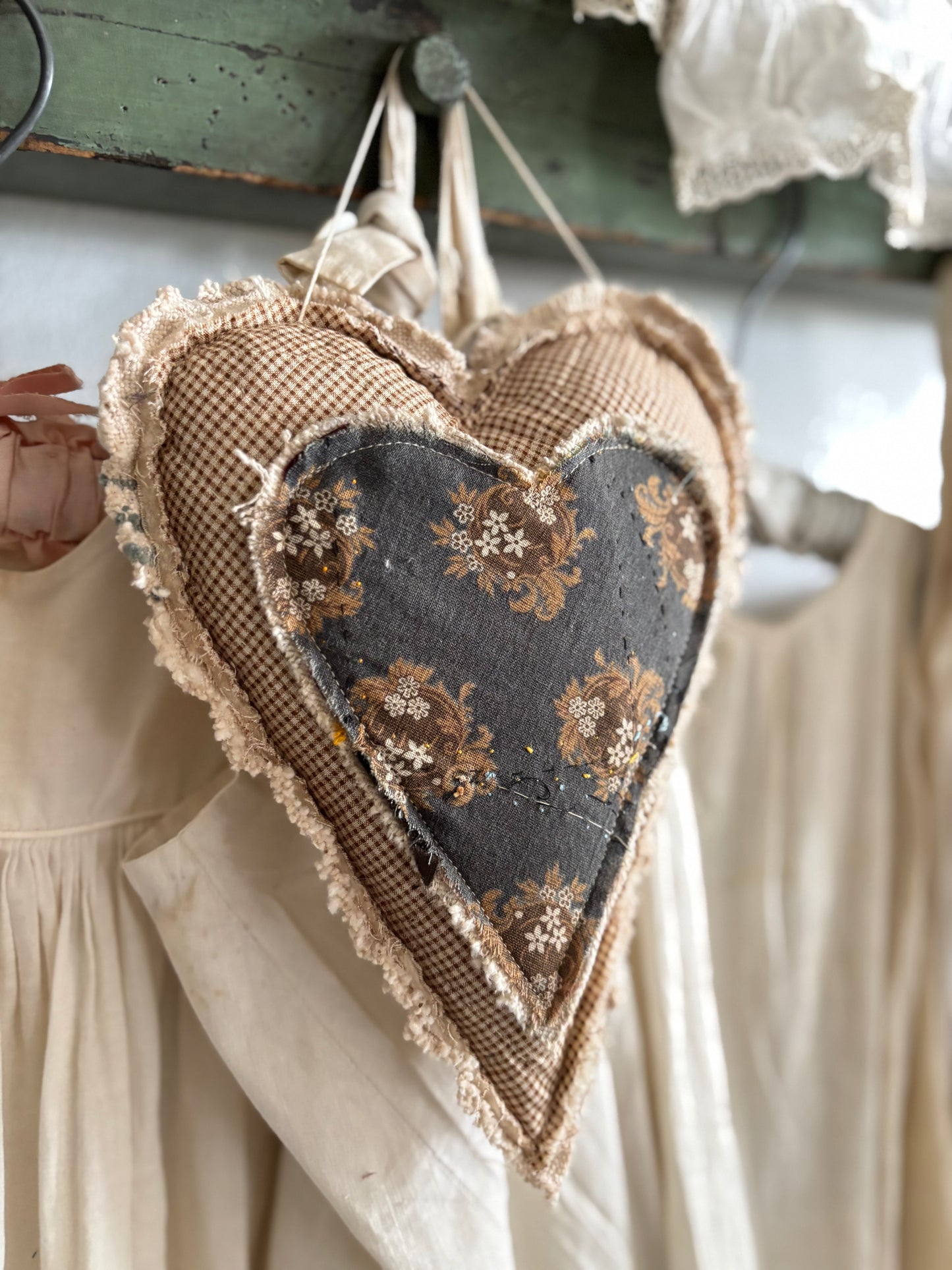 Antique quilt hanging heart
