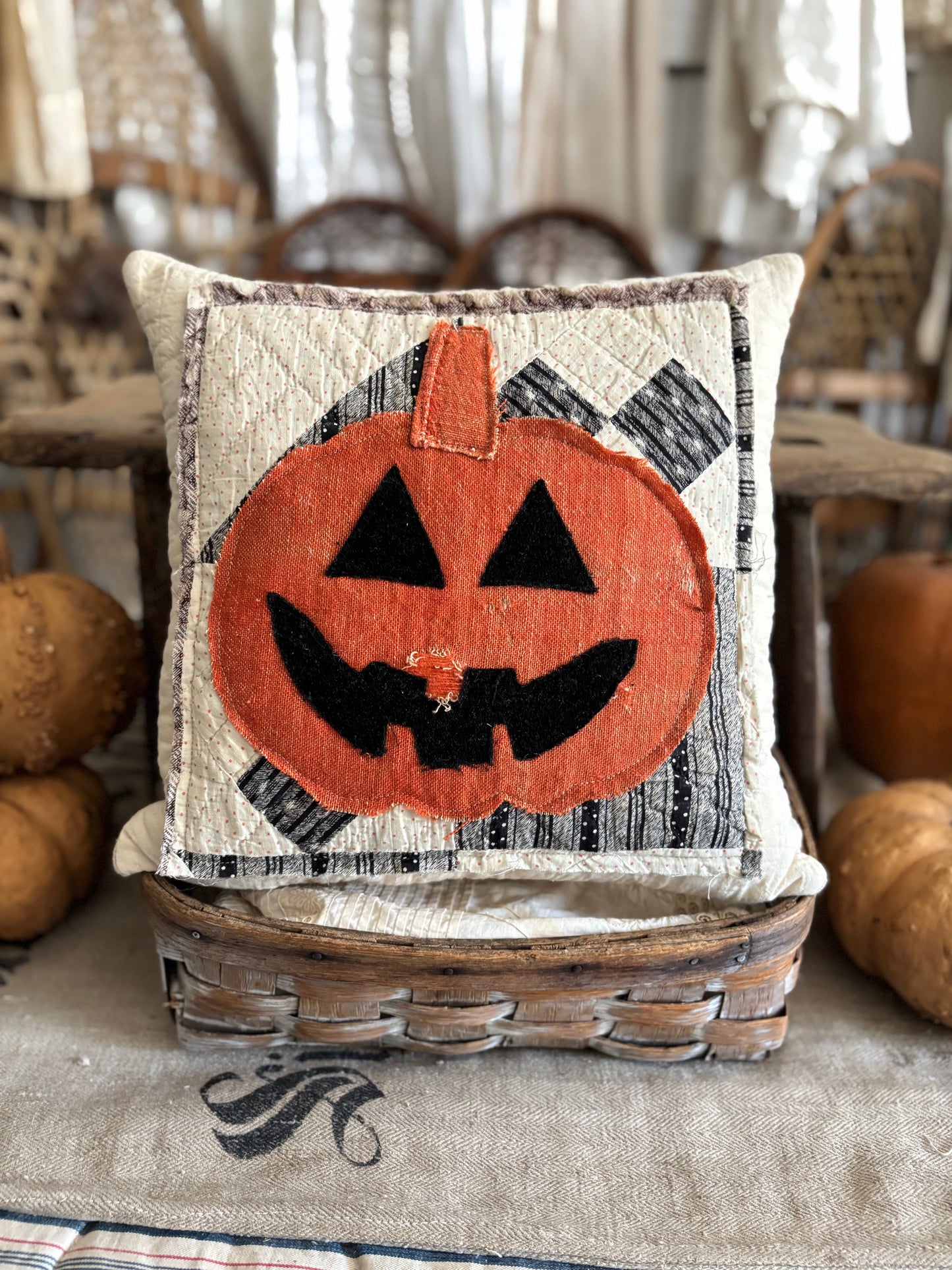 Antique quilt and grain sack Jack pillow