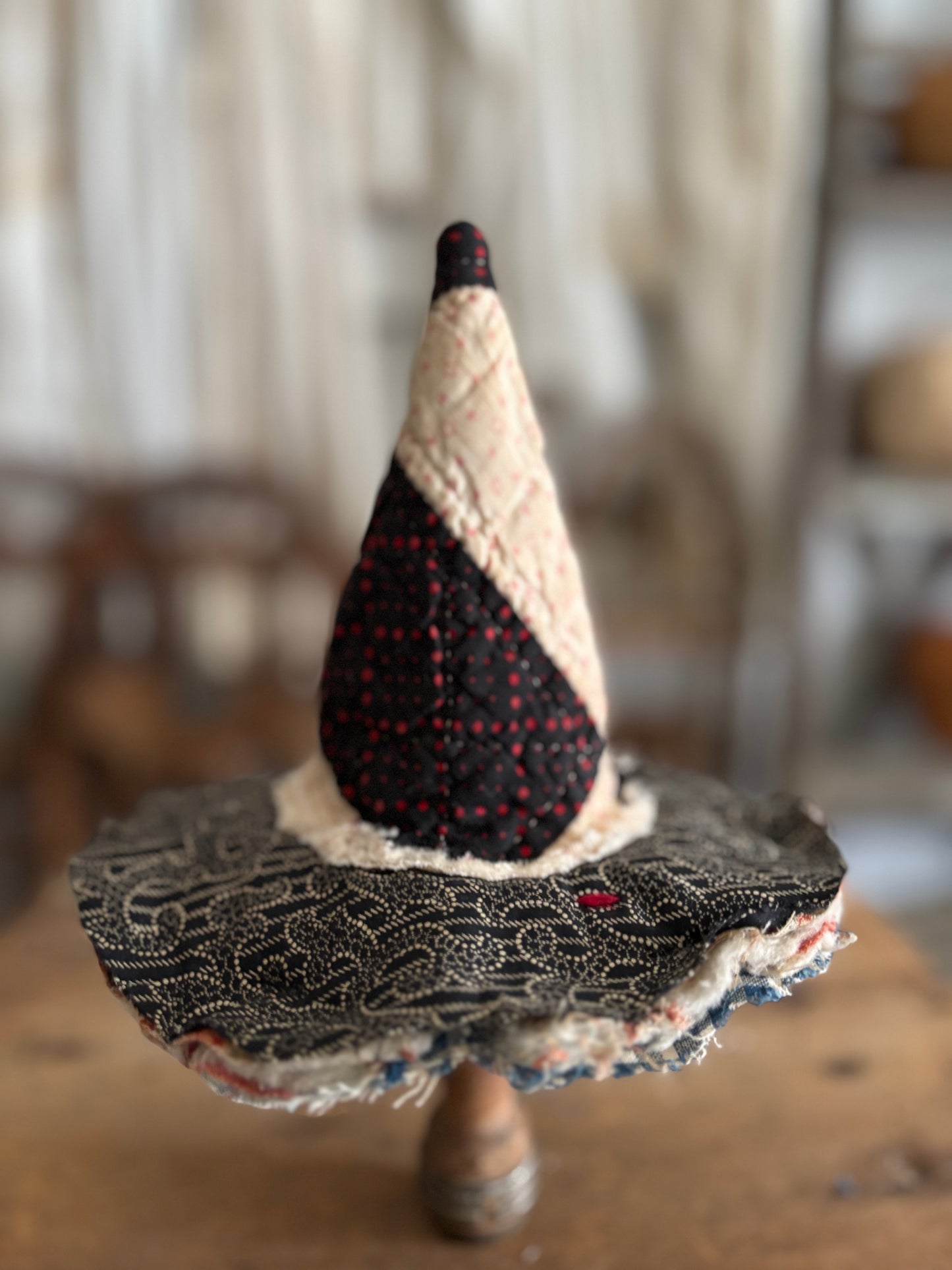 Mini witch hat on spool