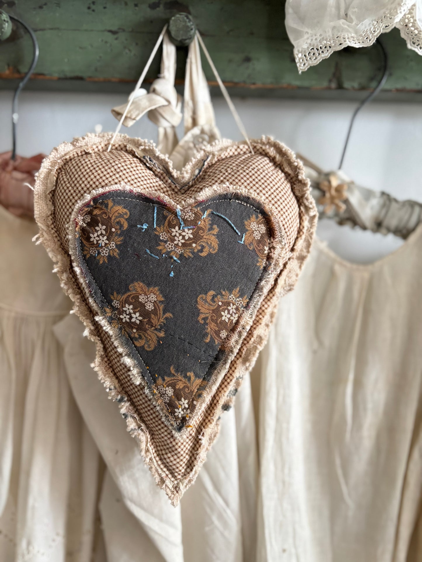 Antique quilt hanging heart