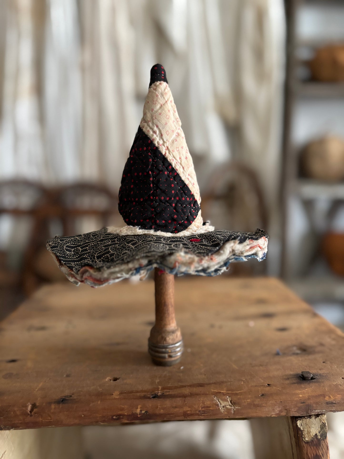 Mini witch hat on spool