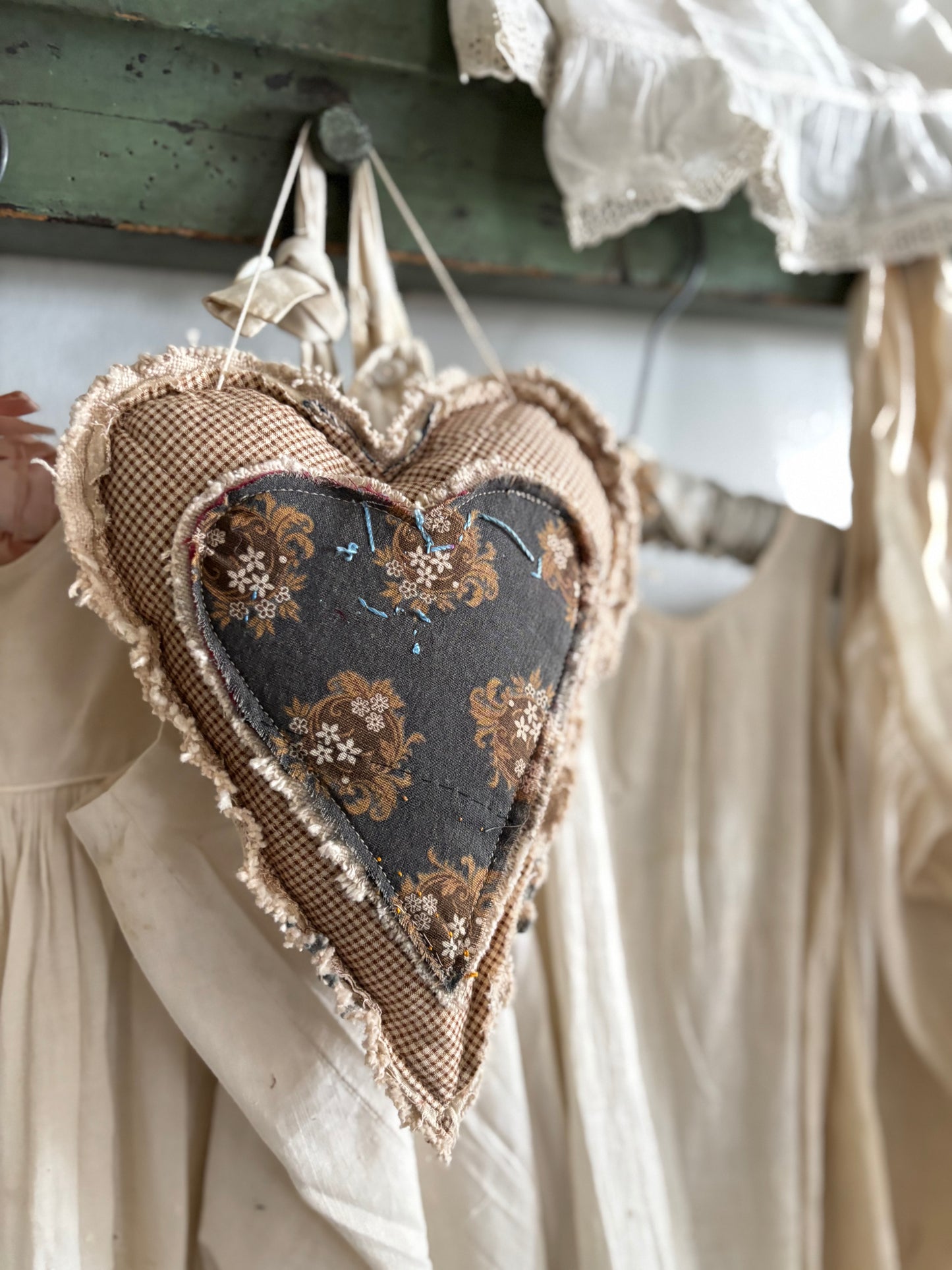 Antique quilt hanging heart