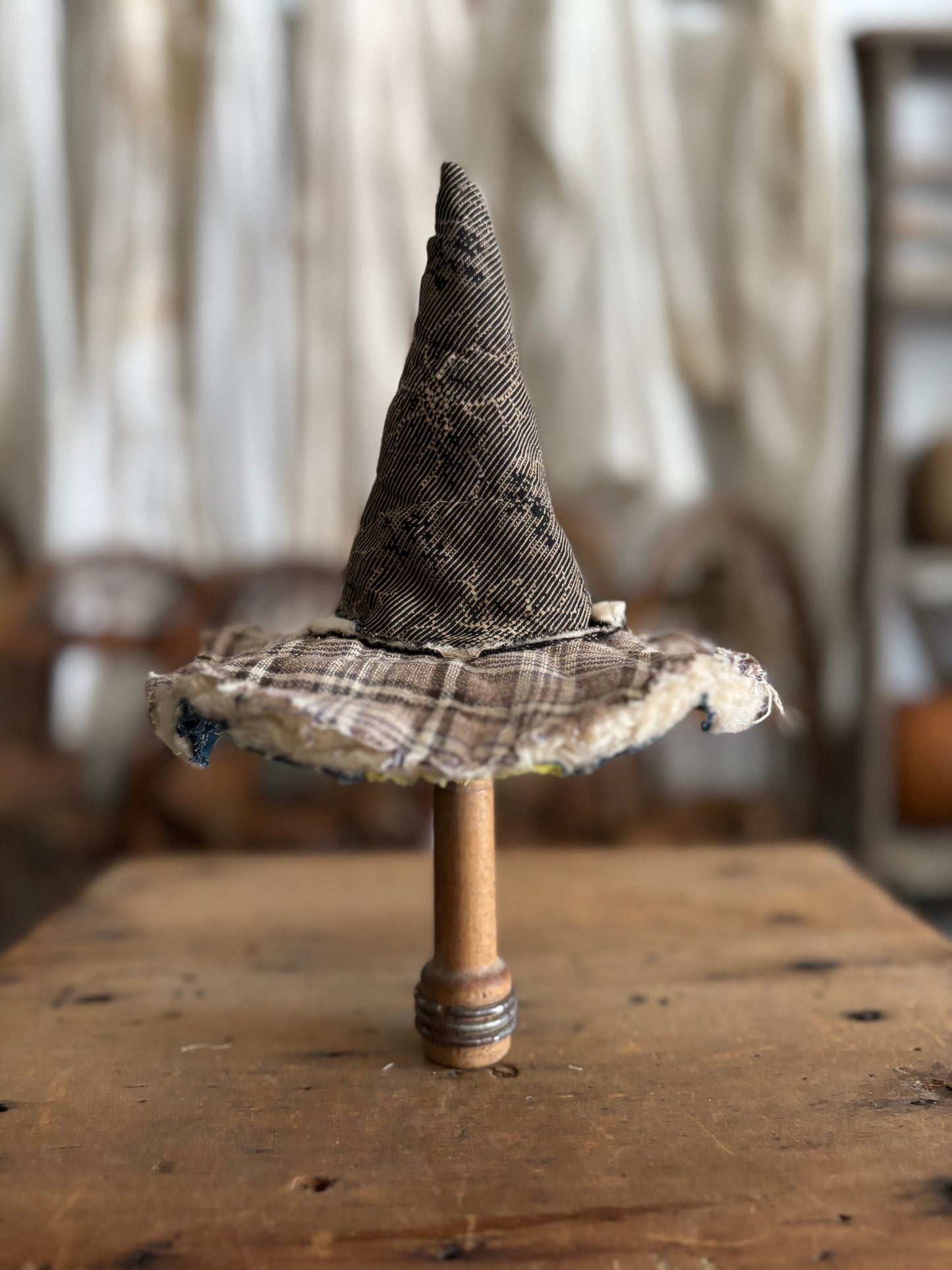 Mini witch hat on spool
