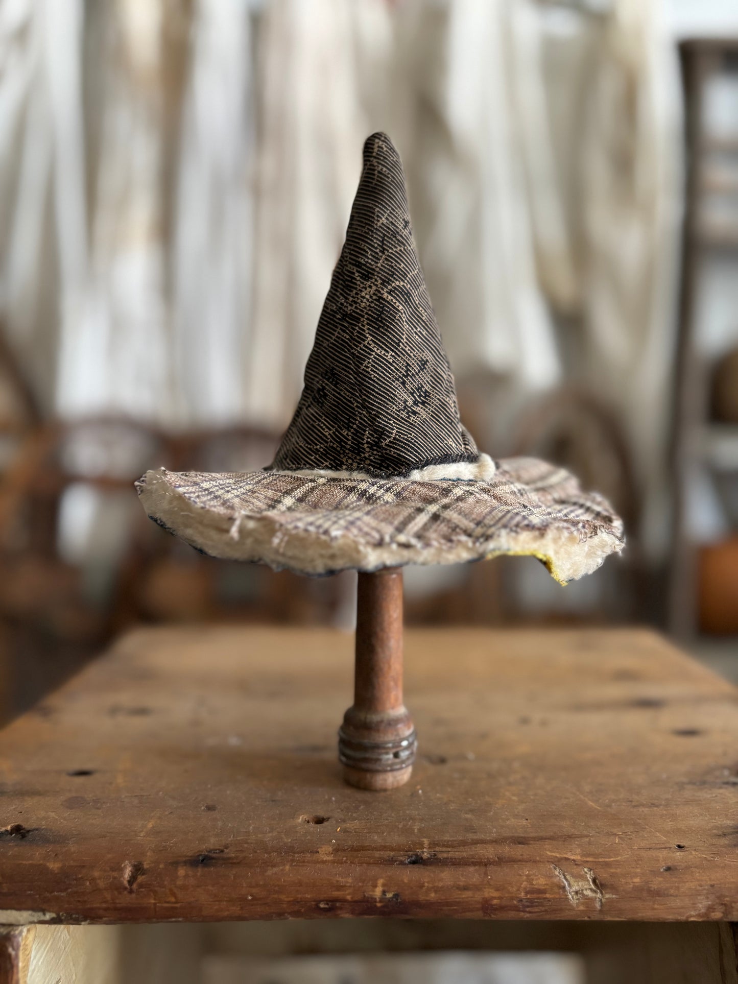 Mini witch hat on spool