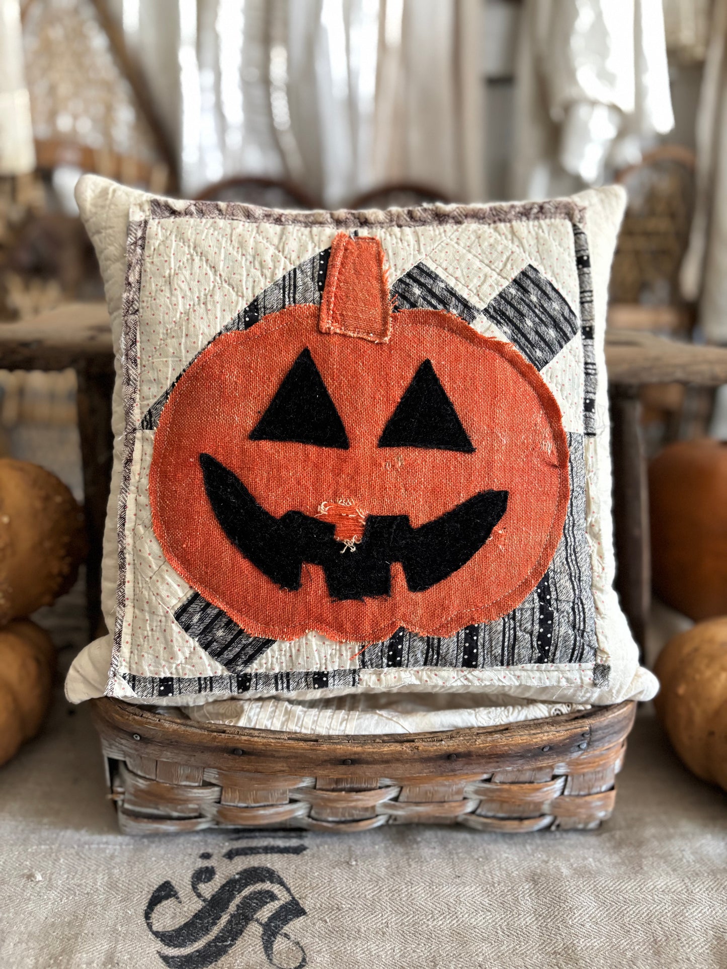 Antique quilt and grain sack Jack pillow