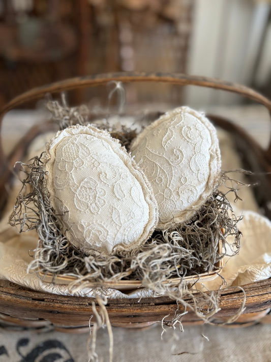 Antique lace eggs in berry basket