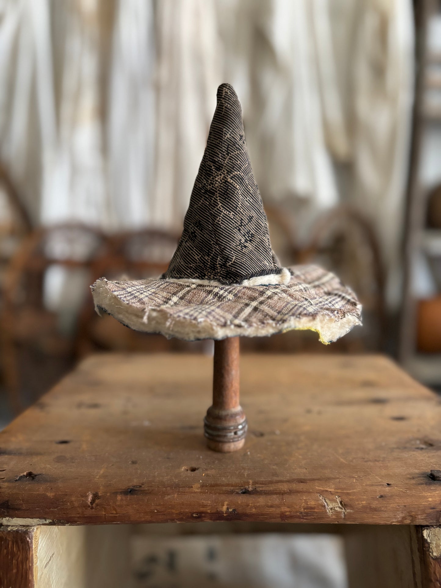 Mini witch hat on spool